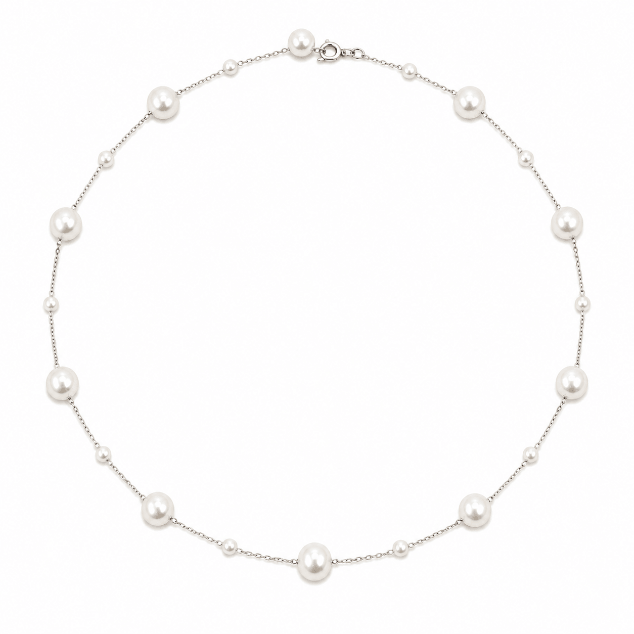 A delicate silver chain necklace featuring large, round white freshwater pearls spaced evenly along the chain, displayed on a clean white background.