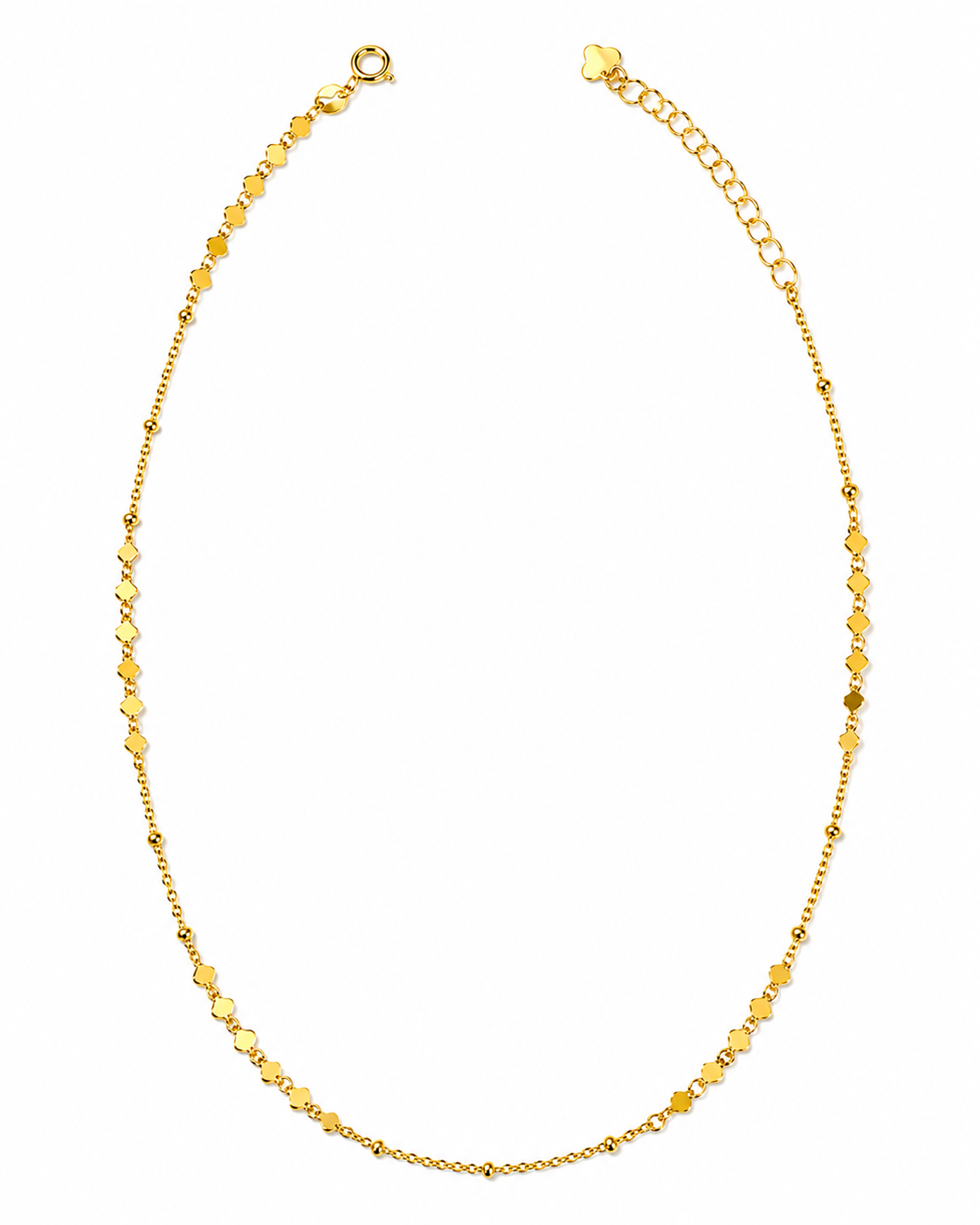 A delicate yellow gold chain necklace with small, repeating textured beads, displayed in an oval shape against a plain white background.