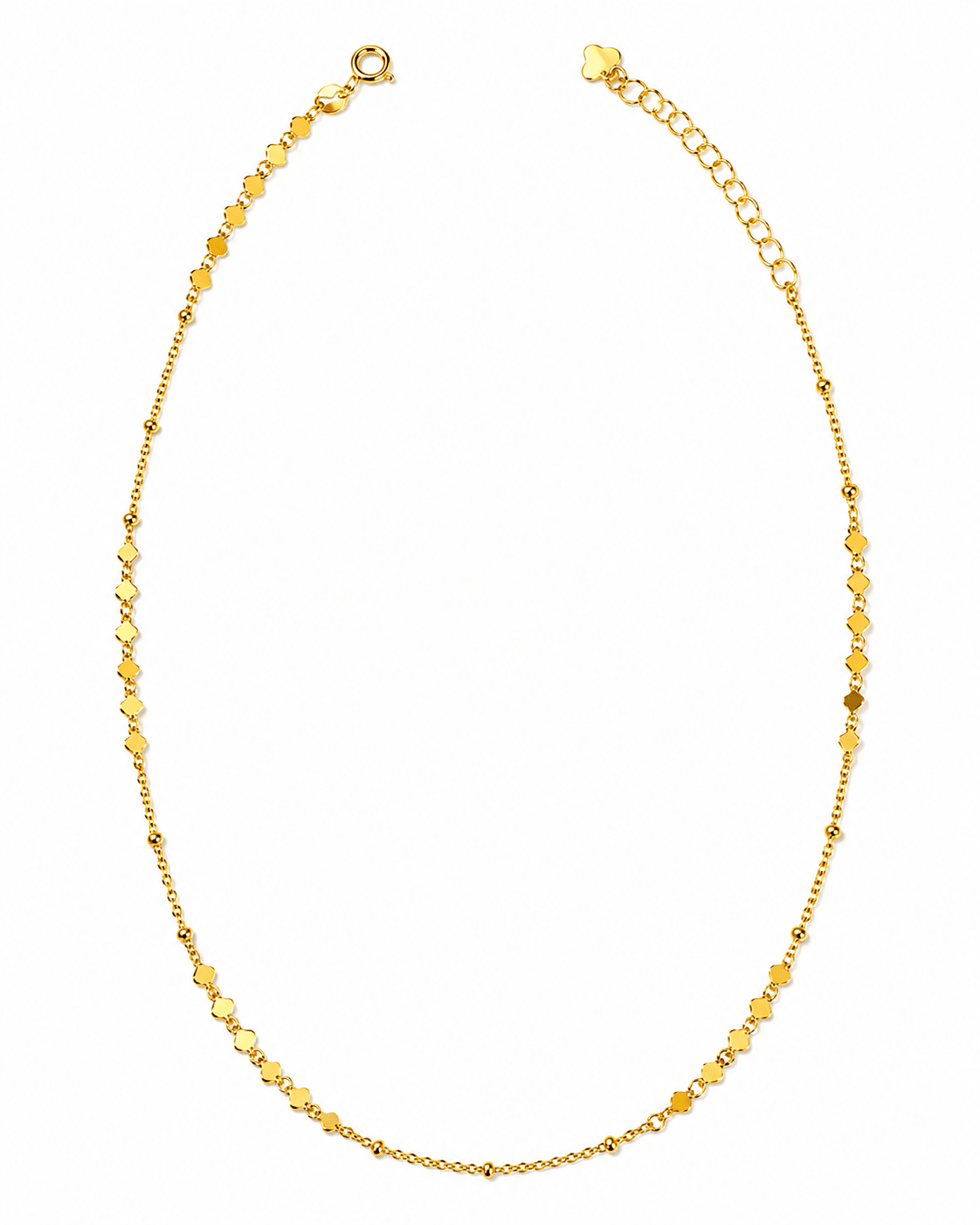 A delicate yellow gold chain necklace with small, repeating textured beads, displayed in an oval shape against a plain white background.
