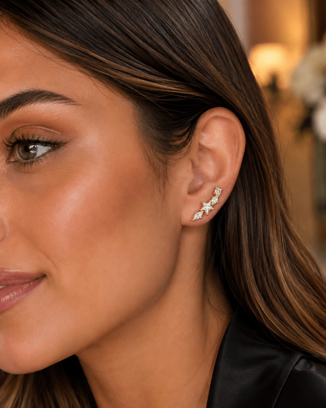 Woman wearing the Celeste Gold Crystal Ear Climber Earrings