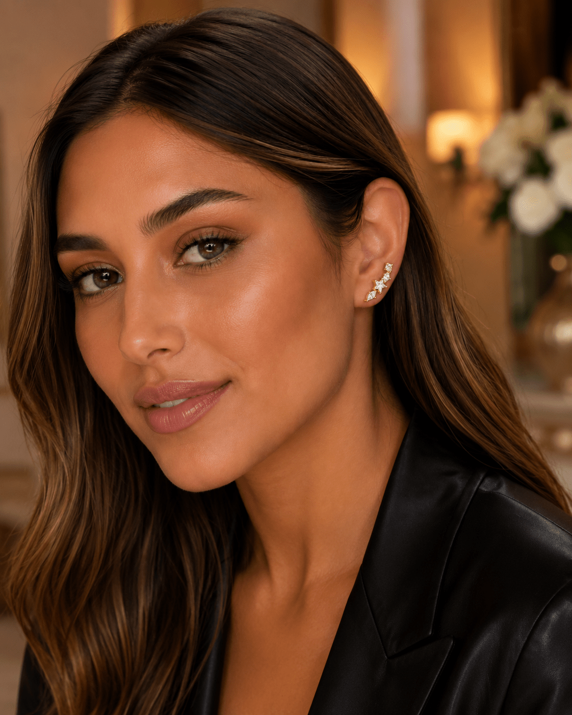 Close-up of Celeste Gold Crystal Ear Climber Earrings showing the crystal line