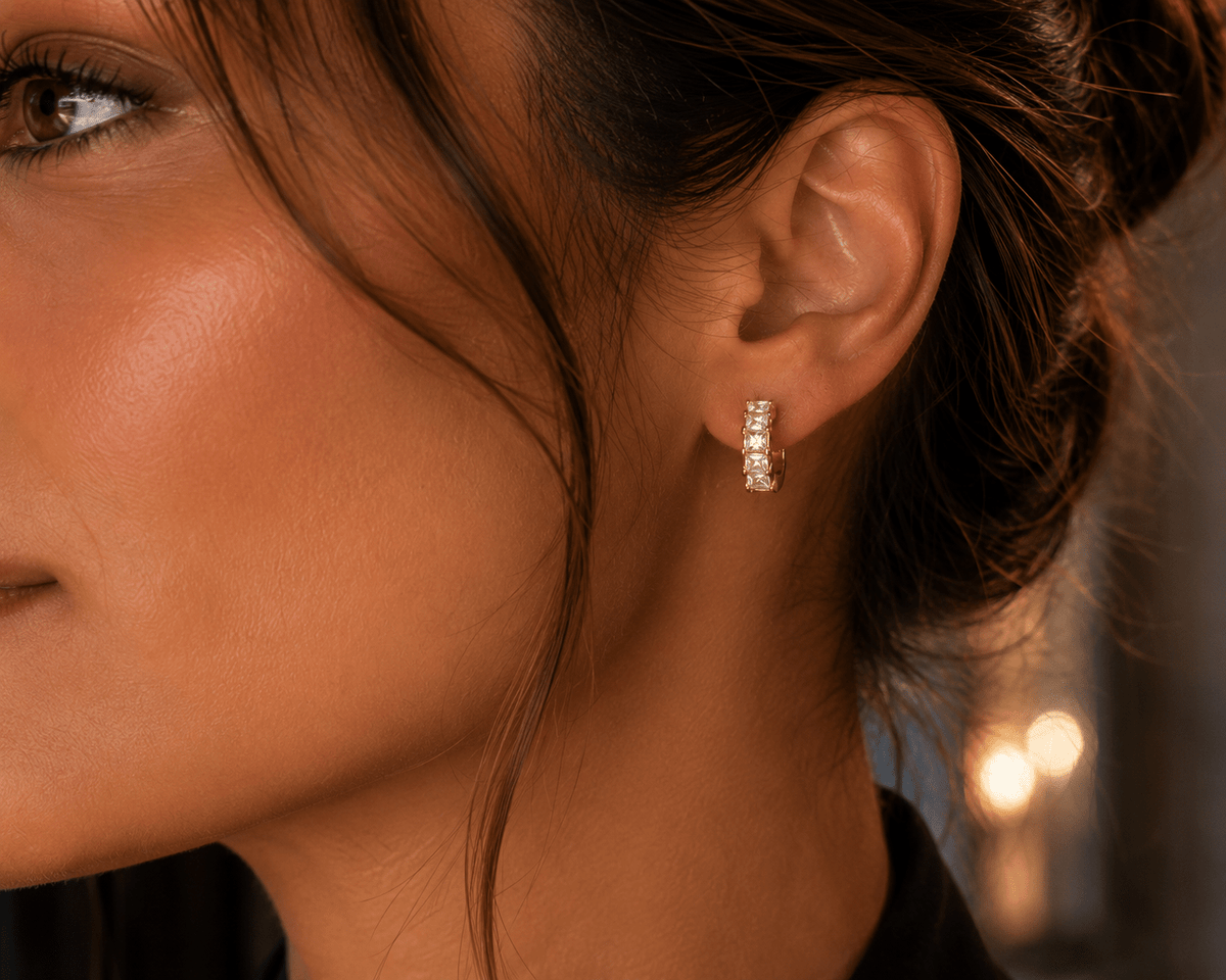 Woman wearing the Noor Gold Crystal Bar Hoop Earrings