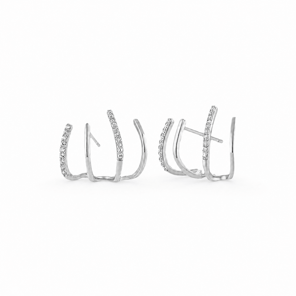 Woman wearing the Alba Gold Crystal Ear Climbers