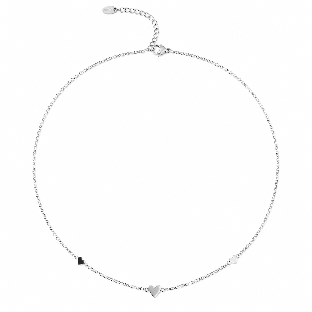 A delicate silver chain necklace with three small heart charms, including one black heart and two silver hearts, displayed on a clean white background.