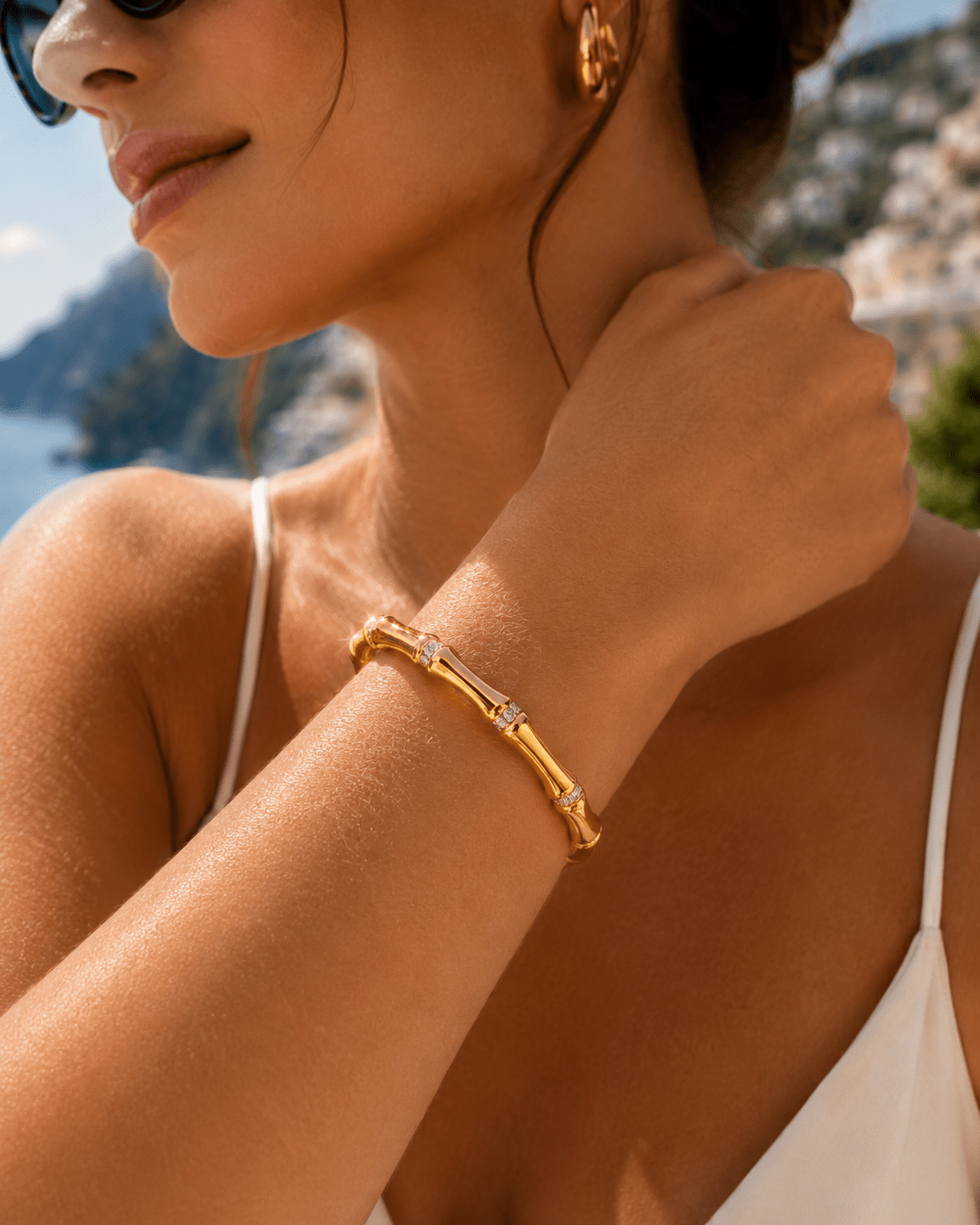 Close-up of Elisa Gold Bamboo Crystal Bangle showing the pavé crystal clusters