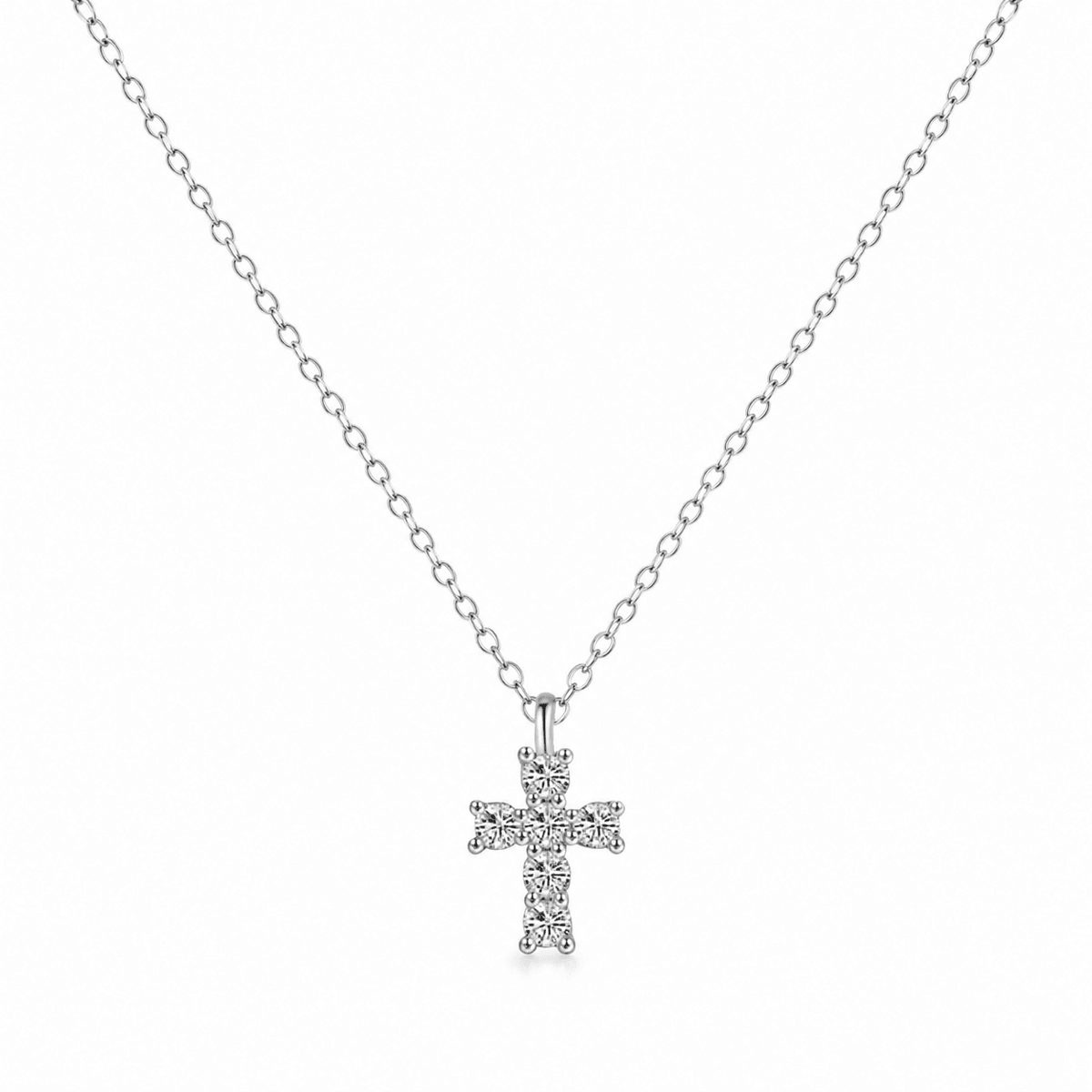 Woman wearing the Vera Gold Mini Cross Necklace