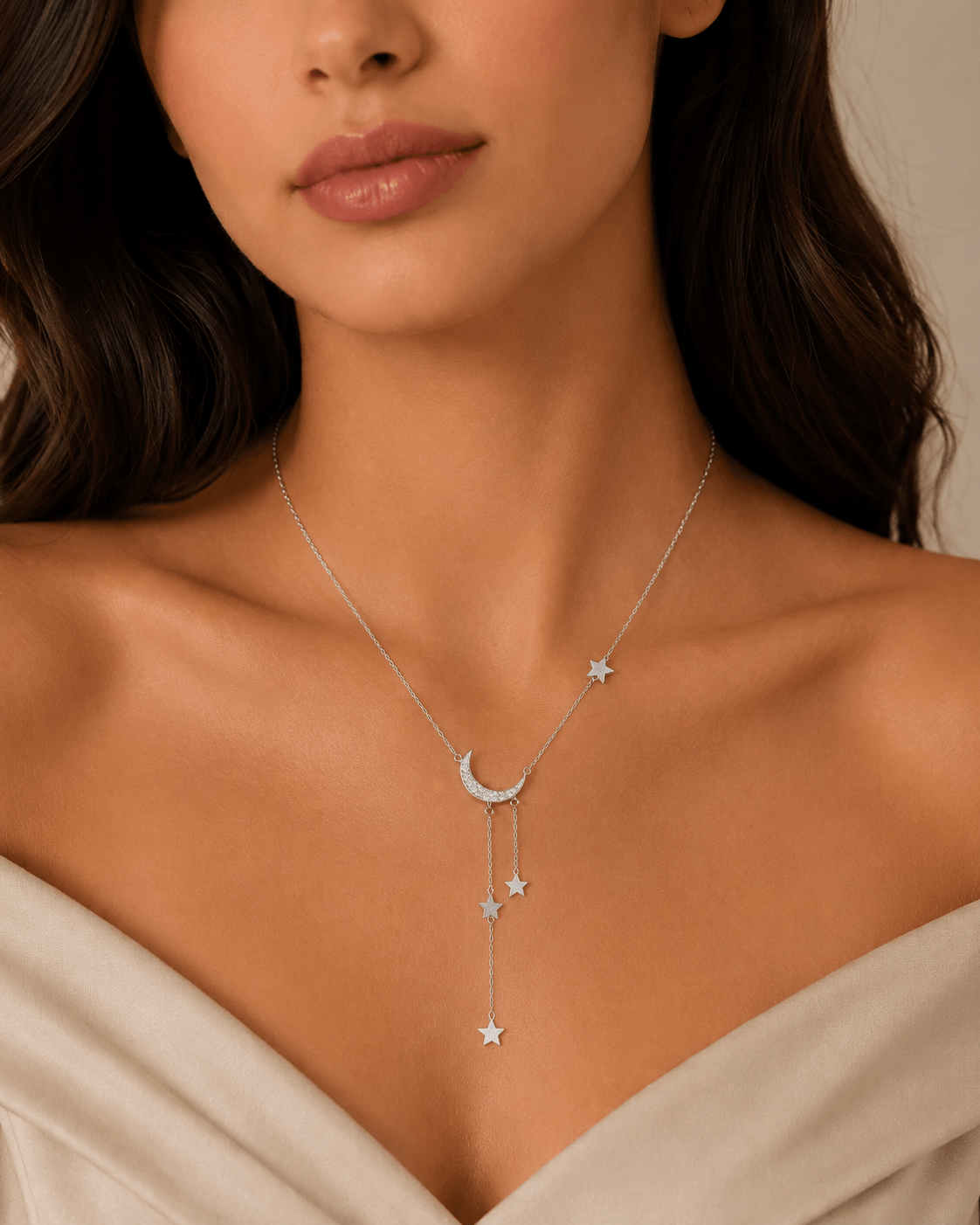 Woman wearing the Naomi Silver Star and Moon Tassel Necklace