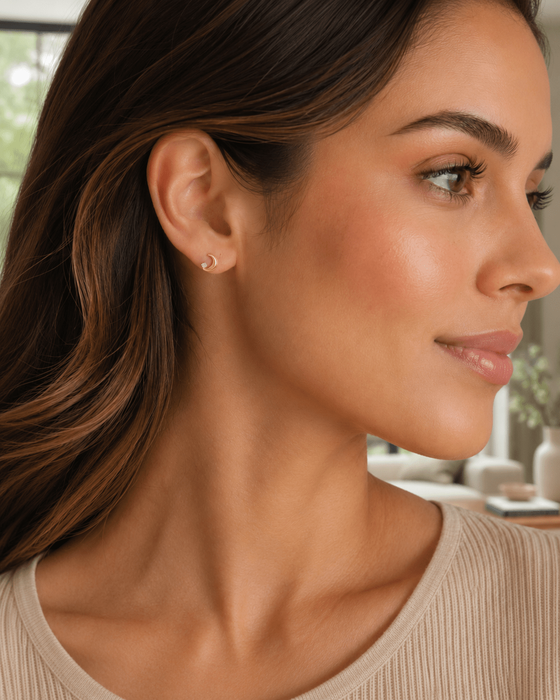 Woman wearing the Phoebe Gold Crystal Moon Stud Earrings