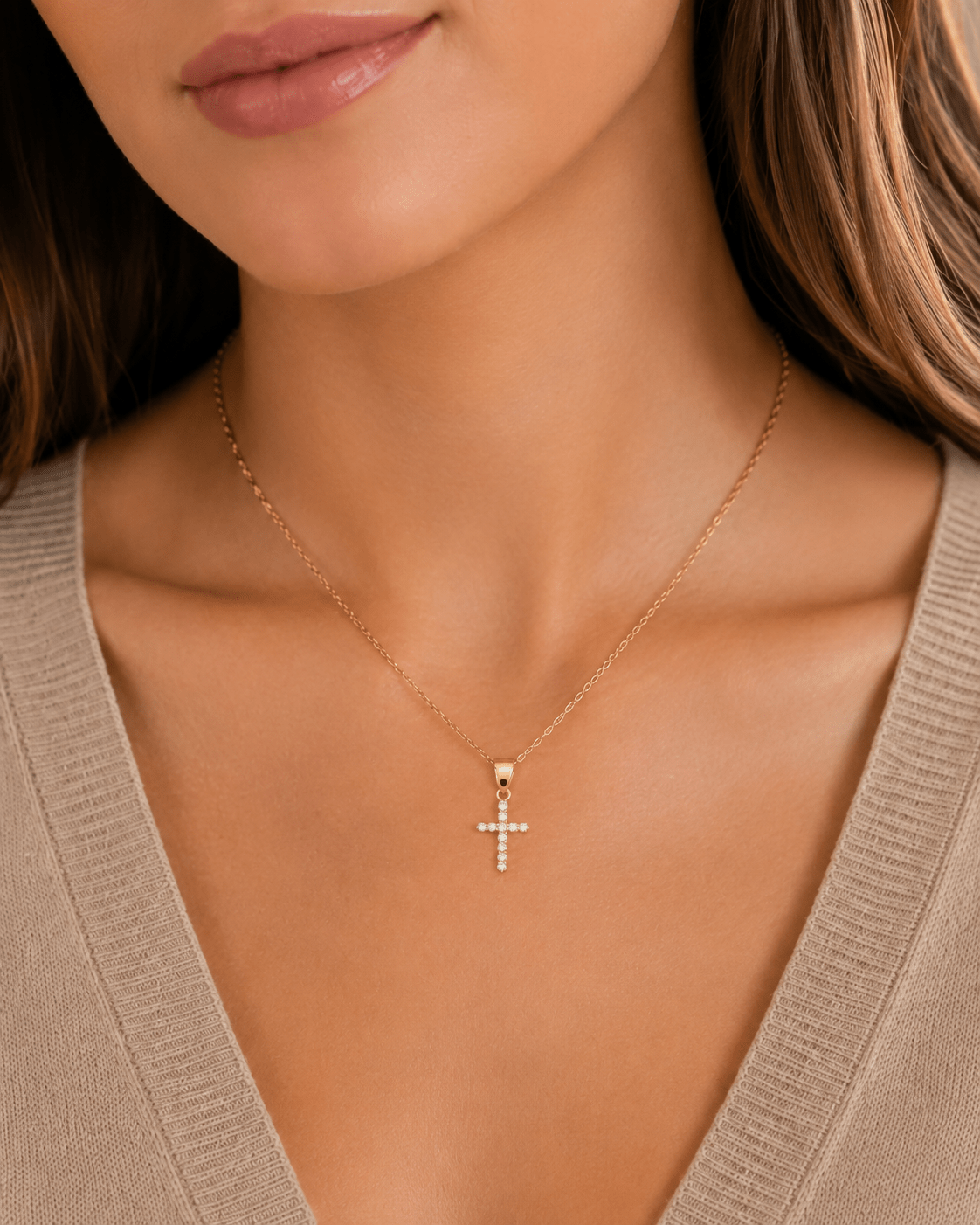 Woman wearing the Lia Gold Cross Necklace