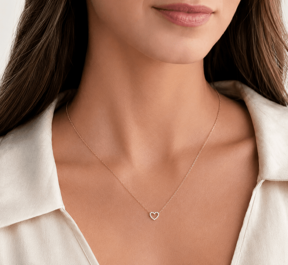 Side view of Kelsey Gold Heart Pendant Necklace showing the chain and clasp