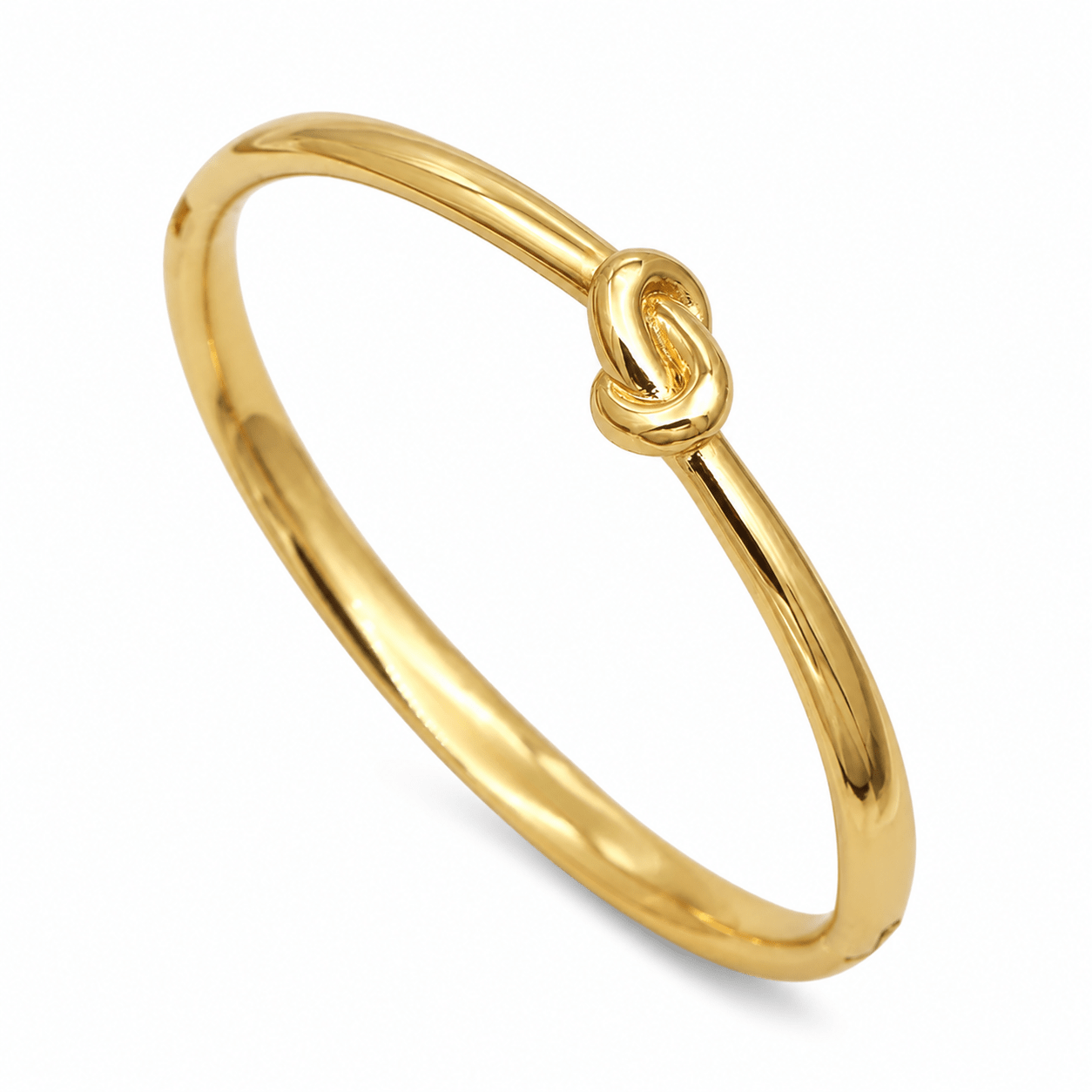 Close-up of Lila gold twist bangle bracelet showing the sculptural knot