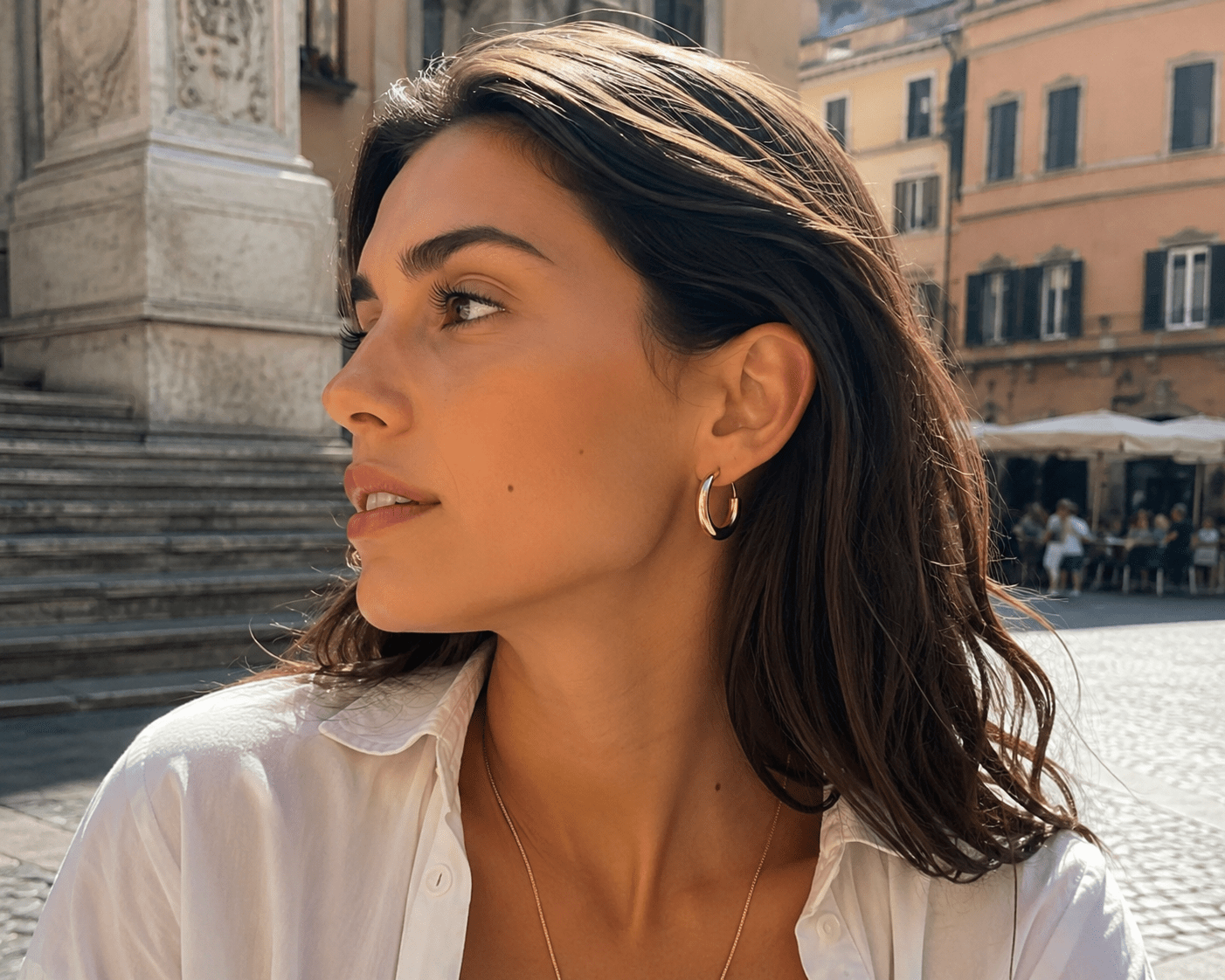 Close-up of Rosalind Gold Hoop Earrings showing the polished hoop