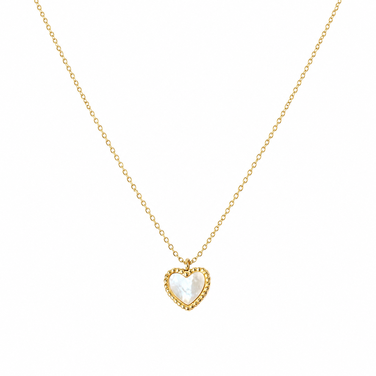 A delicate gold chain necklace featuring a small heart-shaped pendant with a milky white inlay and a textured gold border, set against a plain white background.